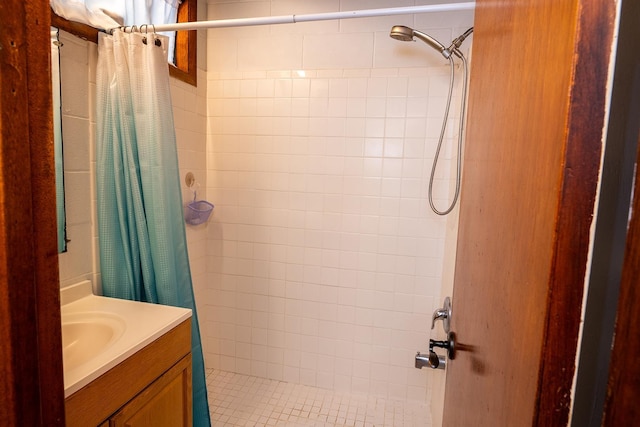 bathroom with vanity and curtained shower