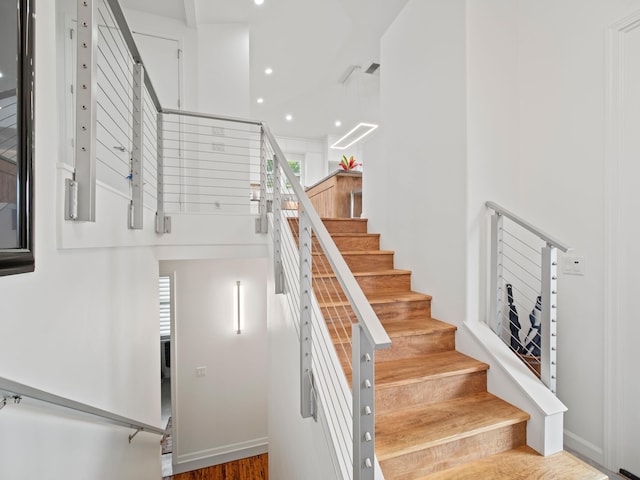 137 Hoohale St, Kihei, HI 96753 - stairway with recessed lighting, a wealth of natural light, wood finished floors, and baseboards