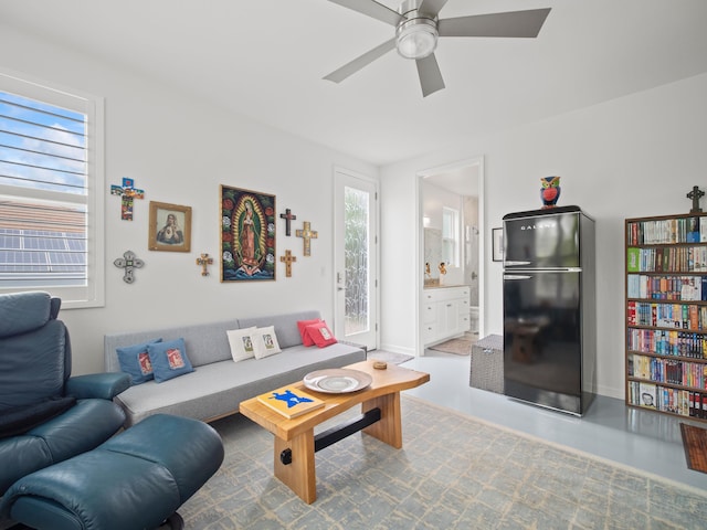 137 Hoohale St, Kihei, HI 96753 - living room with a ceiling fan and baseboards
