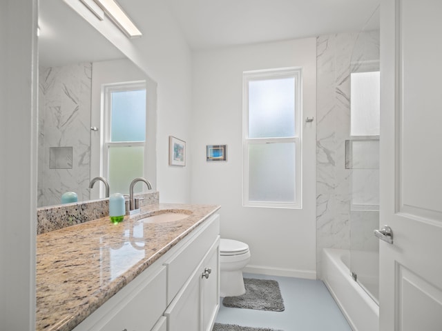 137 Hoohale St, Kihei, HI 96753 - bathroom featuring a wealth of natural light, toilet, vanity, and baseboards