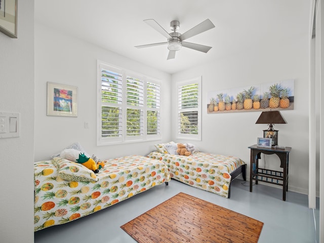 137 Hoohale St, Kihei, HI 96753 - bedroom with a ceiling fan and finished concrete floors