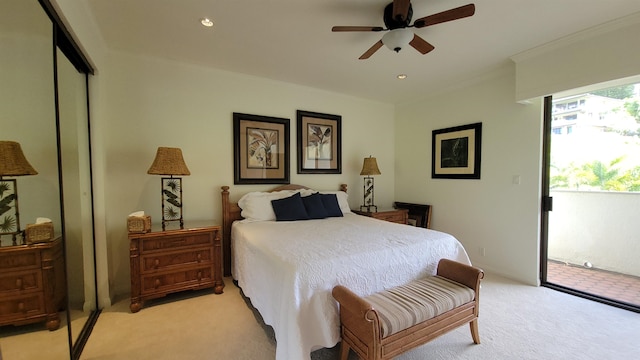 bedroom featuring access to exterior, ornamental molding, light colored carpet, ceiling fan, and a closet