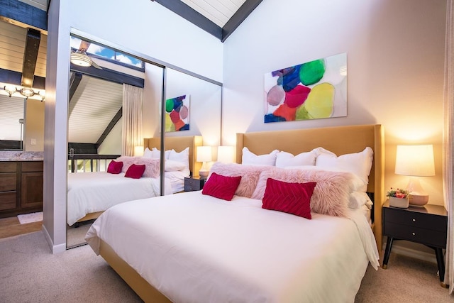 bedroom featuring multiple windows, light colored carpet, and vaulted ceiling