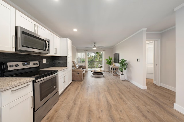 kitchen with tasteful backsplash, stainless steel appliances, light hardwood / wood-style floors, ceiling fan, and ornamental molding