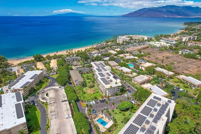 bird's eye view featuring a water and mountain view