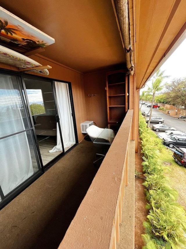 balcony featuring a wall mounted AC