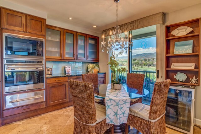 dining space featuring a notable chandelier