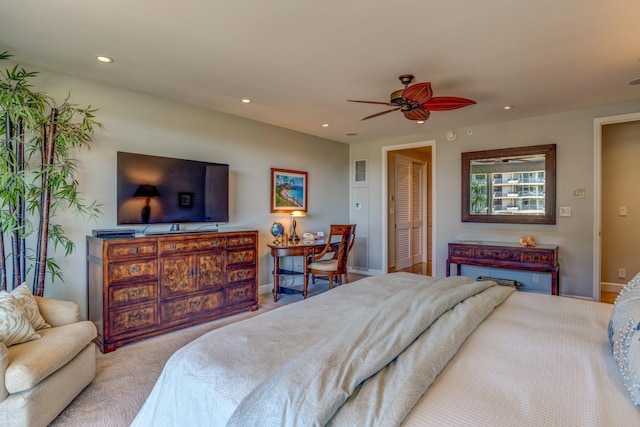 carpeted bedroom with a closet and ceiling fan