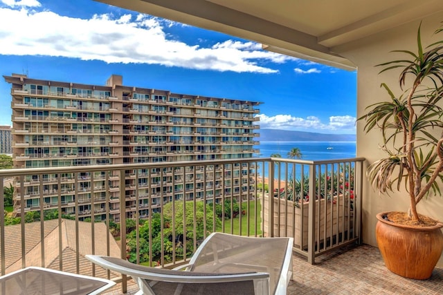 balcony featuring a water view