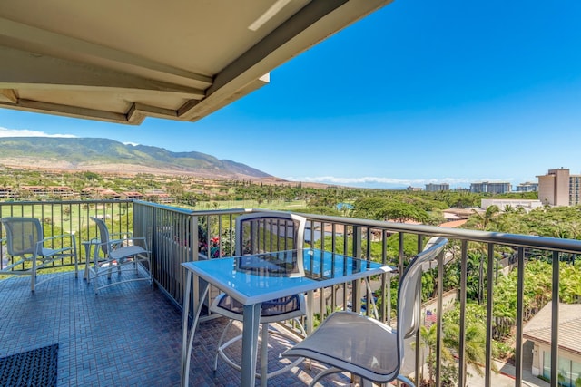 balcony featuring a mountain view