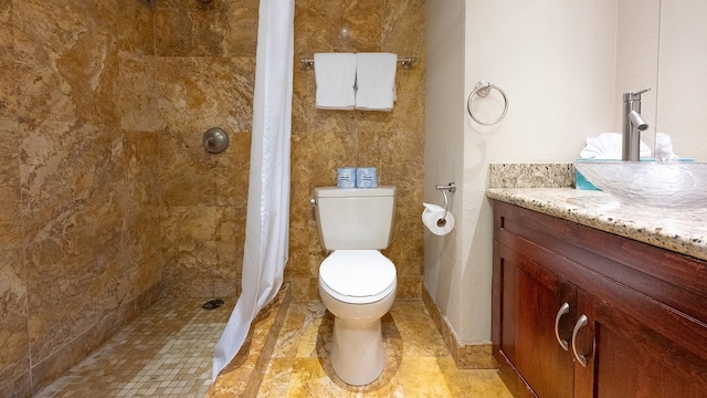 bathroom featuring tile flooring, vanity, toilet, and a shower with shower curtain