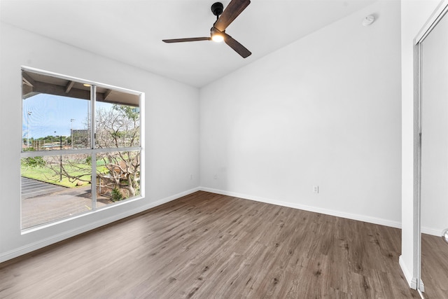 unfurnished room with wood-type flooring and ceiling fan