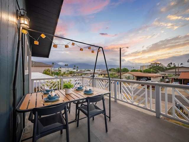 view of balcony at dusk