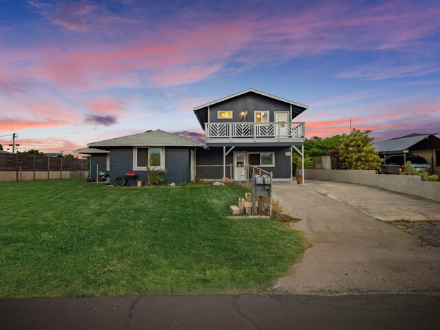 front facade with a yard