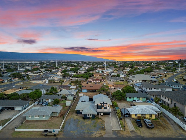 aerial view at dusk with a mountain view