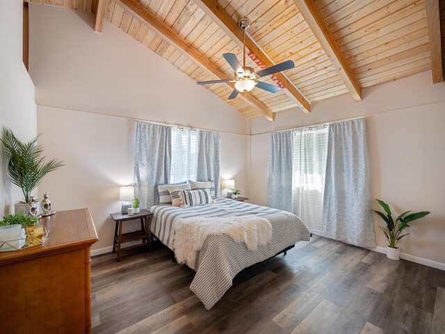 bedroom with ceiling fan, beam ceiling, and dark hardwood / wood-style flooring