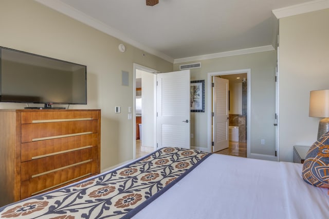 bedroom featuring ornamental molding, ensuite bath, and visible vents