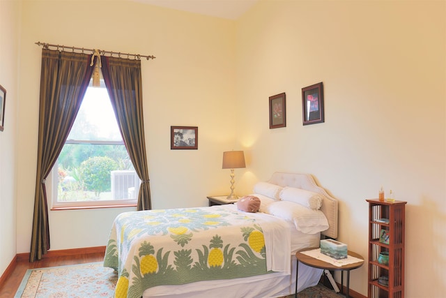 bedroom featuring hardwood / wood-style floors