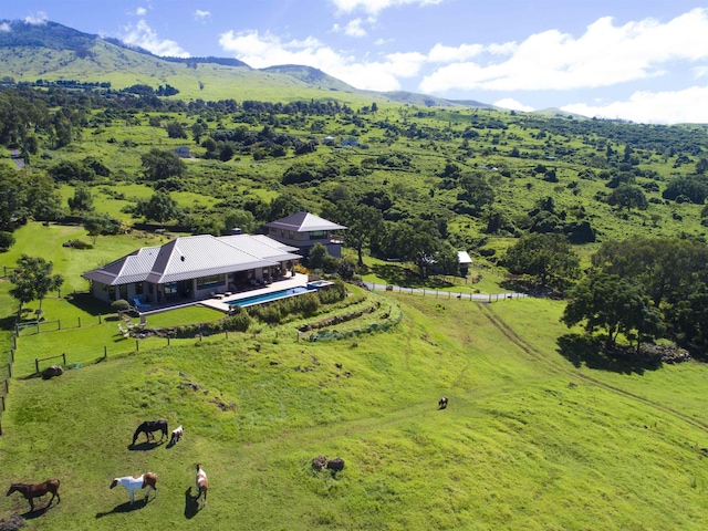 drone / aerial view featuring a rural view and a mountain view