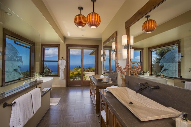 bathroom featuring vanity and a bathing tub