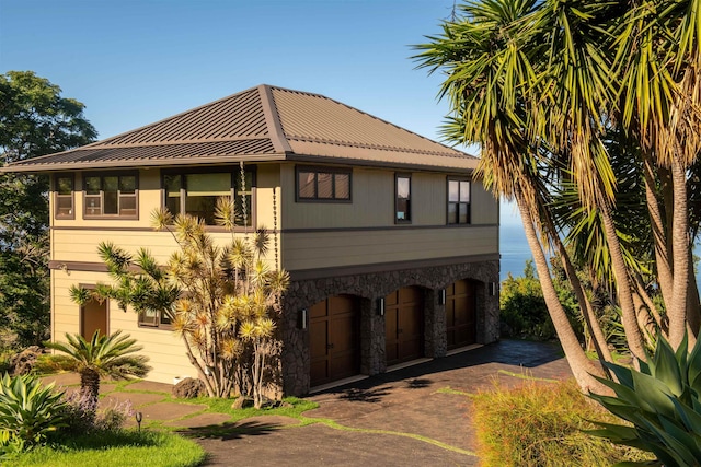 view of front of property with a garage