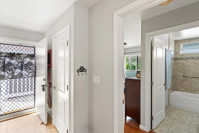 tiled entrance foyer featuring plenty of natural light