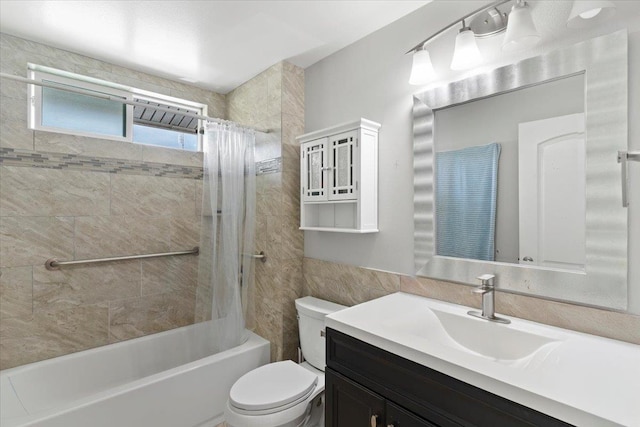 full bathroom featuring vanity, toilet, and shower / bath combo with shower curtain