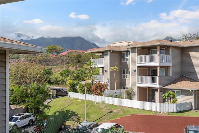 view of building exterior with a mountain view