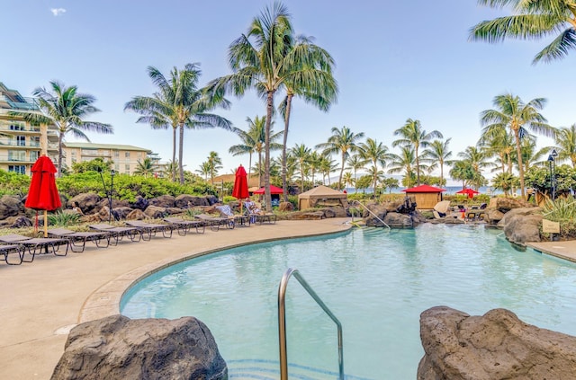 community pool with a patio area
