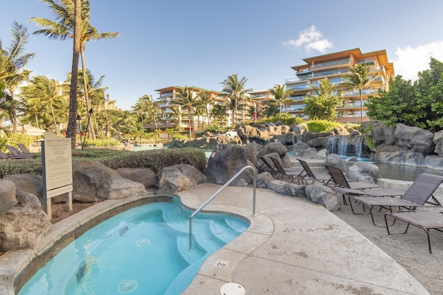 view of pool featuring a patio area