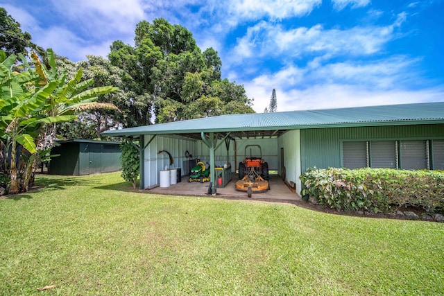 view of outbuilding with a lawn