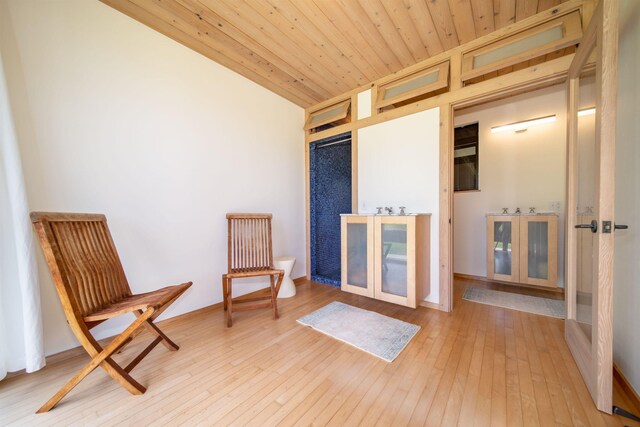 40723 Hana Hwy, Hana, HI 96713 - living area featuring wood ceiling and light hardwood / wood-style flooring