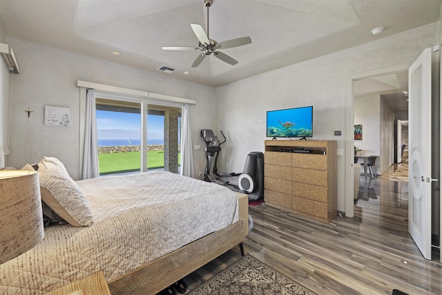 bedroom featuring ceiling fan and wood-type flooring