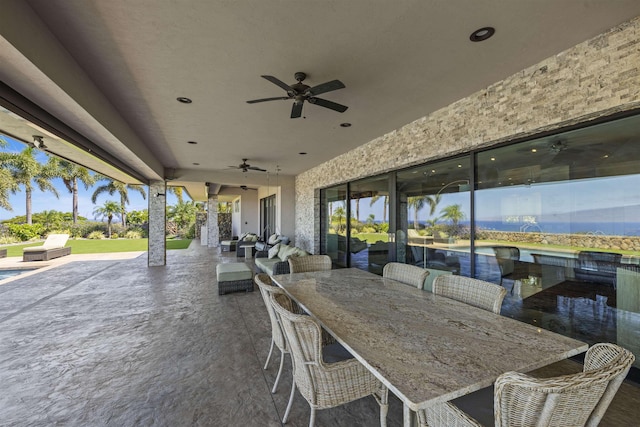 view of patio with ceiling fan