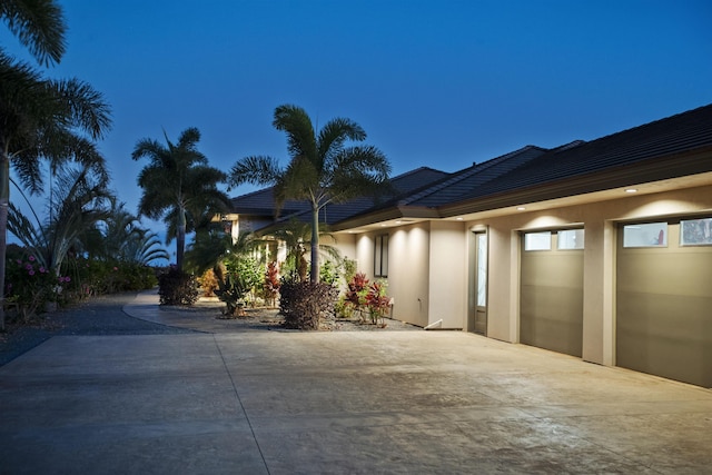 view of property exterior at dusk