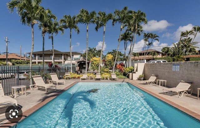 view of pool featuring a patio area