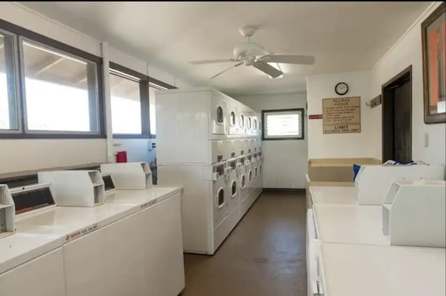 shared laundry area with washer and clothes dryer, stacked washer / dryer, and a ceiling fan