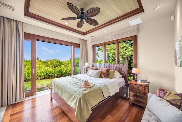34 Ualei Pl, Kihei, HI 96753 - bedroom with visible vents, a tray ceiling, access to exterior, wooden ceiling, and wood-type flooring