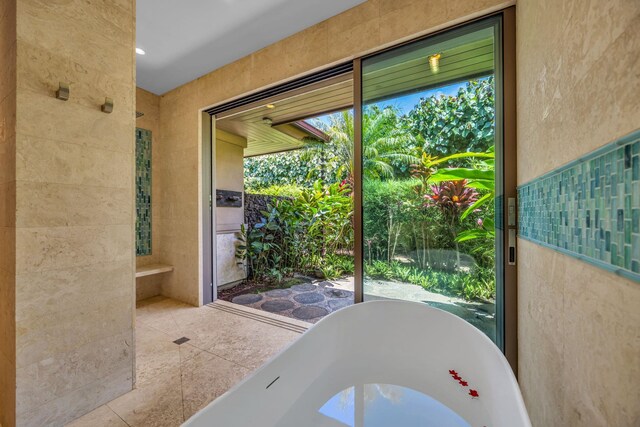 34 Ualei Pl, Kihei, HI 96753 - doorway featuring tile walls, a wealth of natural light, and tile patterned flooring