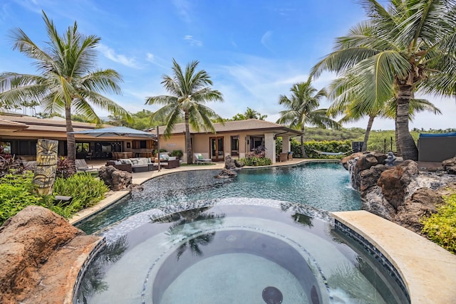 34 Ualei Pl, Kihei, HI 96753 - view of pool featuring an outdoor living space, a pool with connected hot tub, and a patio area