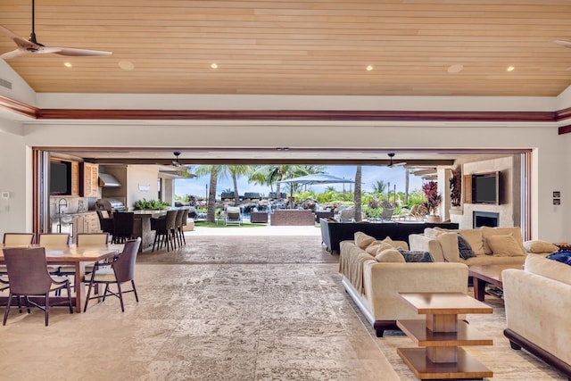 34 Ualei Pl, Kihei, HI 96753 - living area with a fireplace, ceiling fan, visible vents, vaulted ceiling, and wood ceiling
