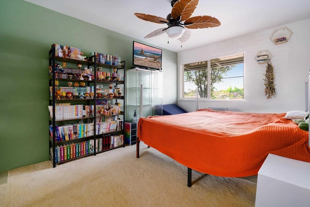 bedroom featuring ceiling fan and carpet floors