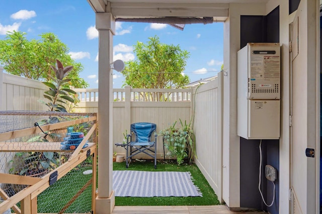 view of patio featuring fence