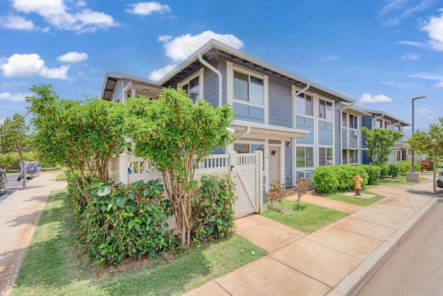 multi unit property featuring a gate
