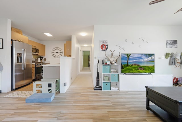 living area with light wood finished floors