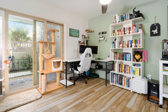 home office featuring wood finished floors
