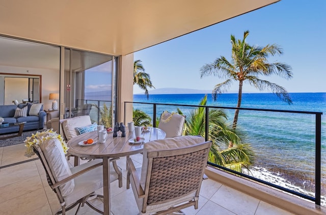 balcony featuring a water view