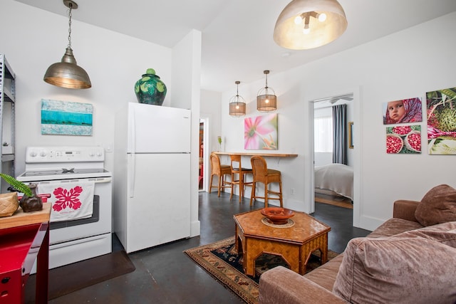 kitchen with white appliances and decorative light fixtures