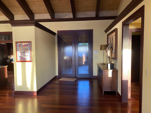 foyer featuring french doors, dark wood-type flooring, wooden ceiling, beamed ceiling, and baseboards