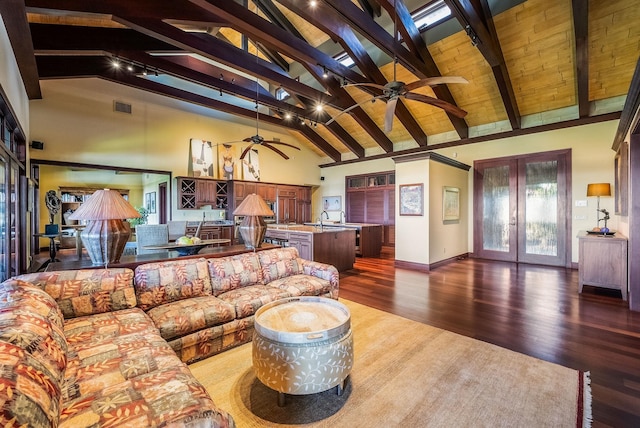 living room featuring baseboards, visible vents, dark wood-style floors, french doors, and high vaulted ceiling